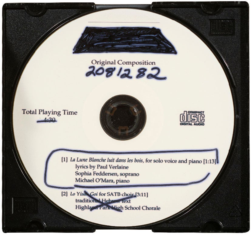 A photo of a burned CD of original compositions.