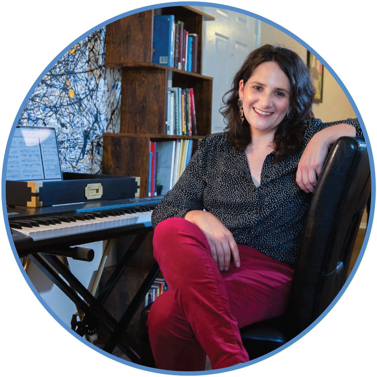 Photo of Dana Kaufman, assistant professor of music composition, at her keyboard.